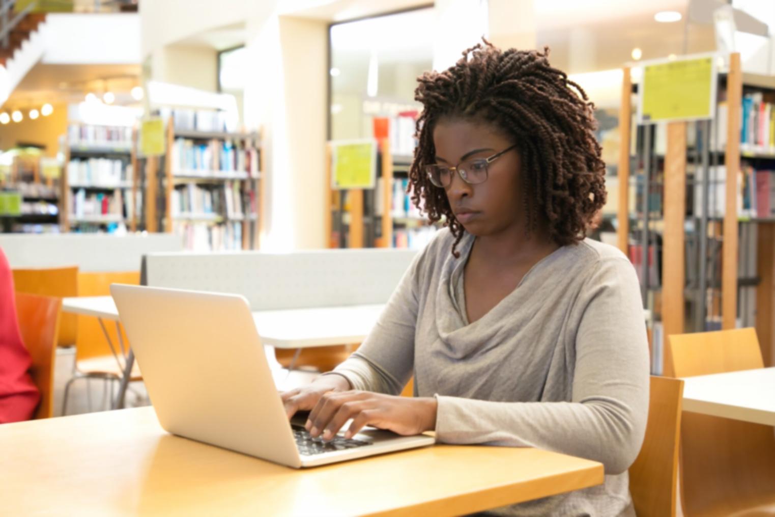 Professional reviewing financial reports and data visualizations